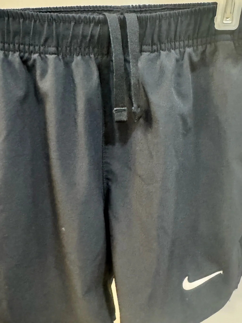 Nike Kids Black and Blue Athletic Shorts with White Swoosh Accent